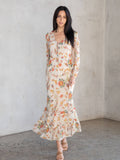 Meadow sheer floral modest maxi dress with long sleeves, button front, and detachable lining