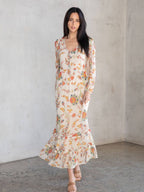Meadow sheer floral modest maxi dress with long sleeves, button front, and detachable lining