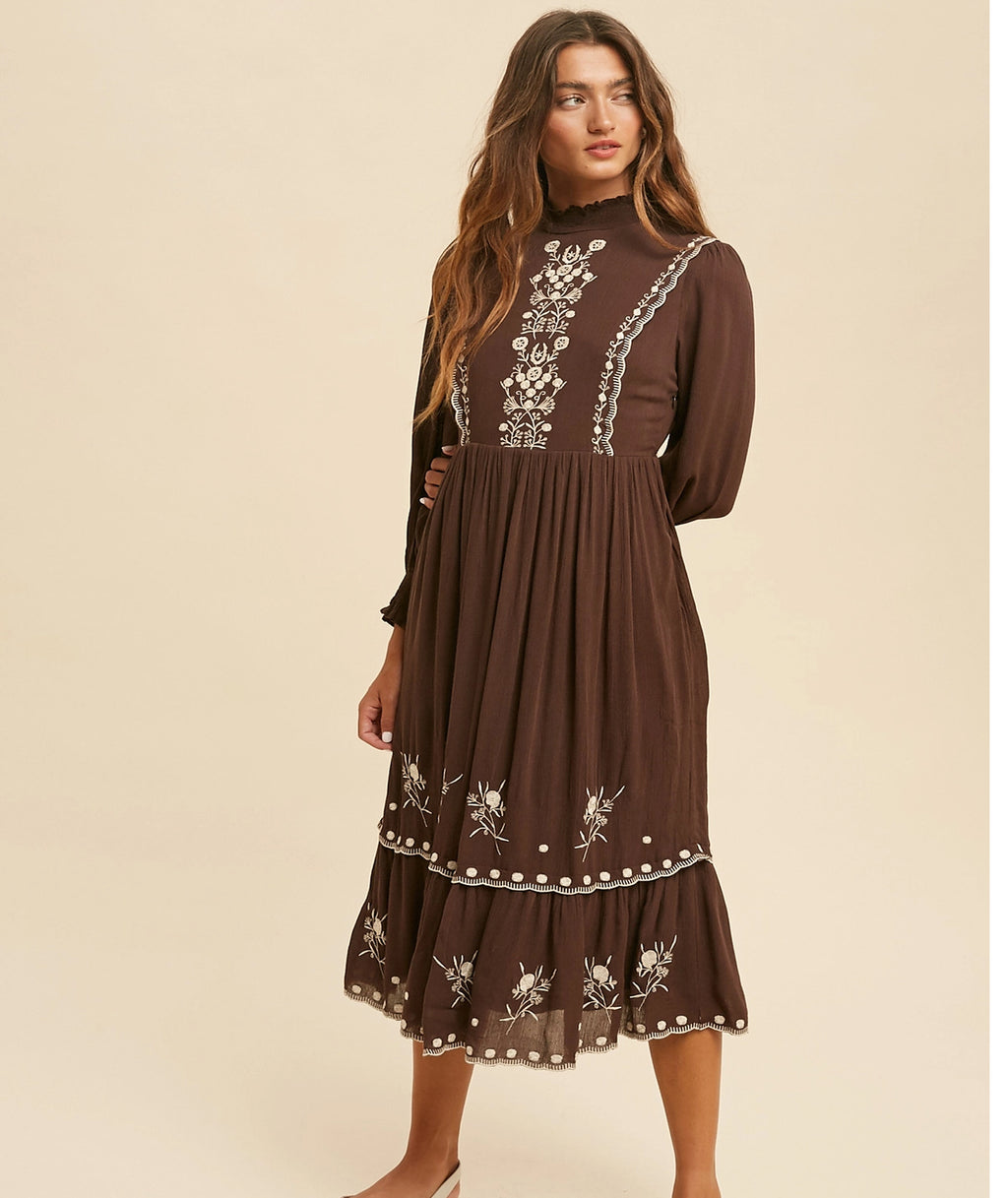 The Cassia chocolate-brown modest dress with cream floral embroidery and a tiered skirt