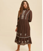 The Cassia chocolate-brown modest dress with cream floral embroidery and a tiered skirt