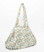 Block-printed quilted cotton floral tote bag with two styling options and magnetic snaps