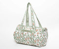 Small rose-and-vine block-printed quilted cotton temple duffel
