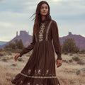 The Cassia chocolate-brown modest dress with cream floral embroidery and a tiered skirt