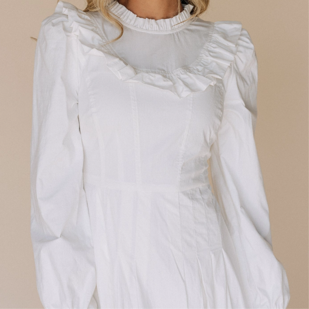 The Nauvoo LDS temple dress — ruffle and pocket detail
