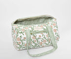 Small rose-and-vine block-printed quilted cotton temple duffel