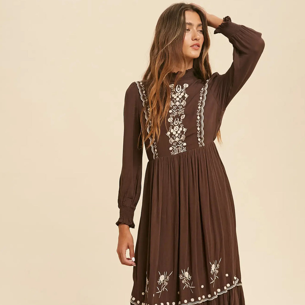 The Cassia chocolate-brown modest dress with cream floral embroidery and a tiered skirt