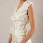 Lemon Blossom yellow ditsy-floral modest peplum top with wrap front and lace trim