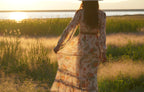 Meadow sheer floral modest maxi dress with long sleeves, button front, and detachable lining