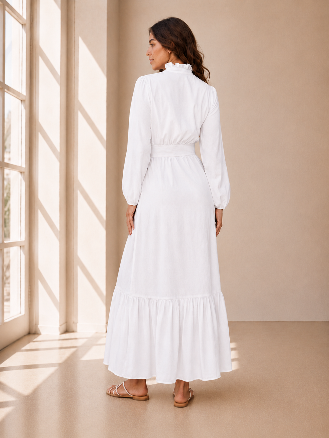 The Brigham City soft white LDS temple dress with a ruffle collar, tiered skirt, and pockets