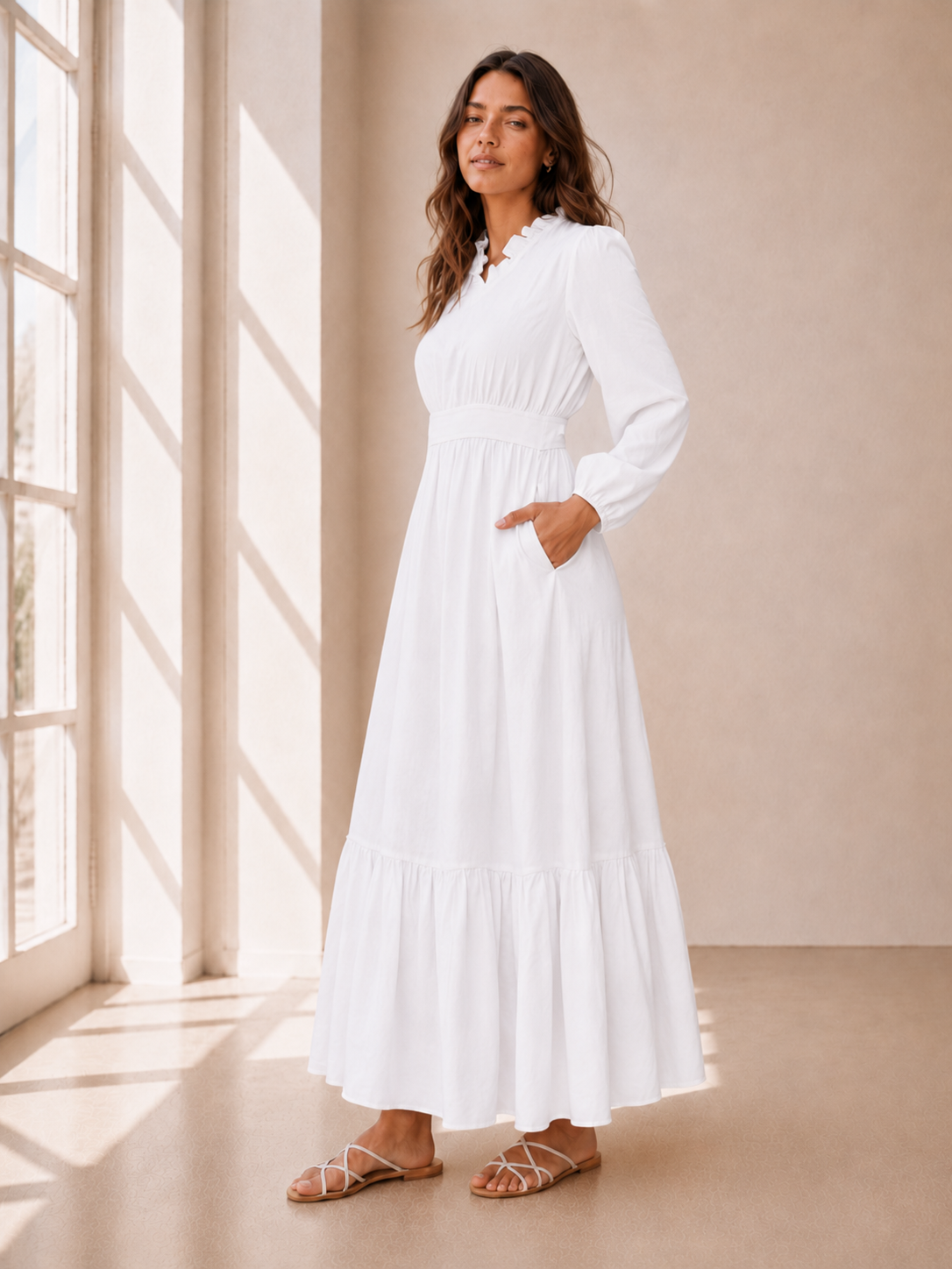 The Brigham City soft white LDS temple dress with a ruffle collar, tiered skirt, and pockets