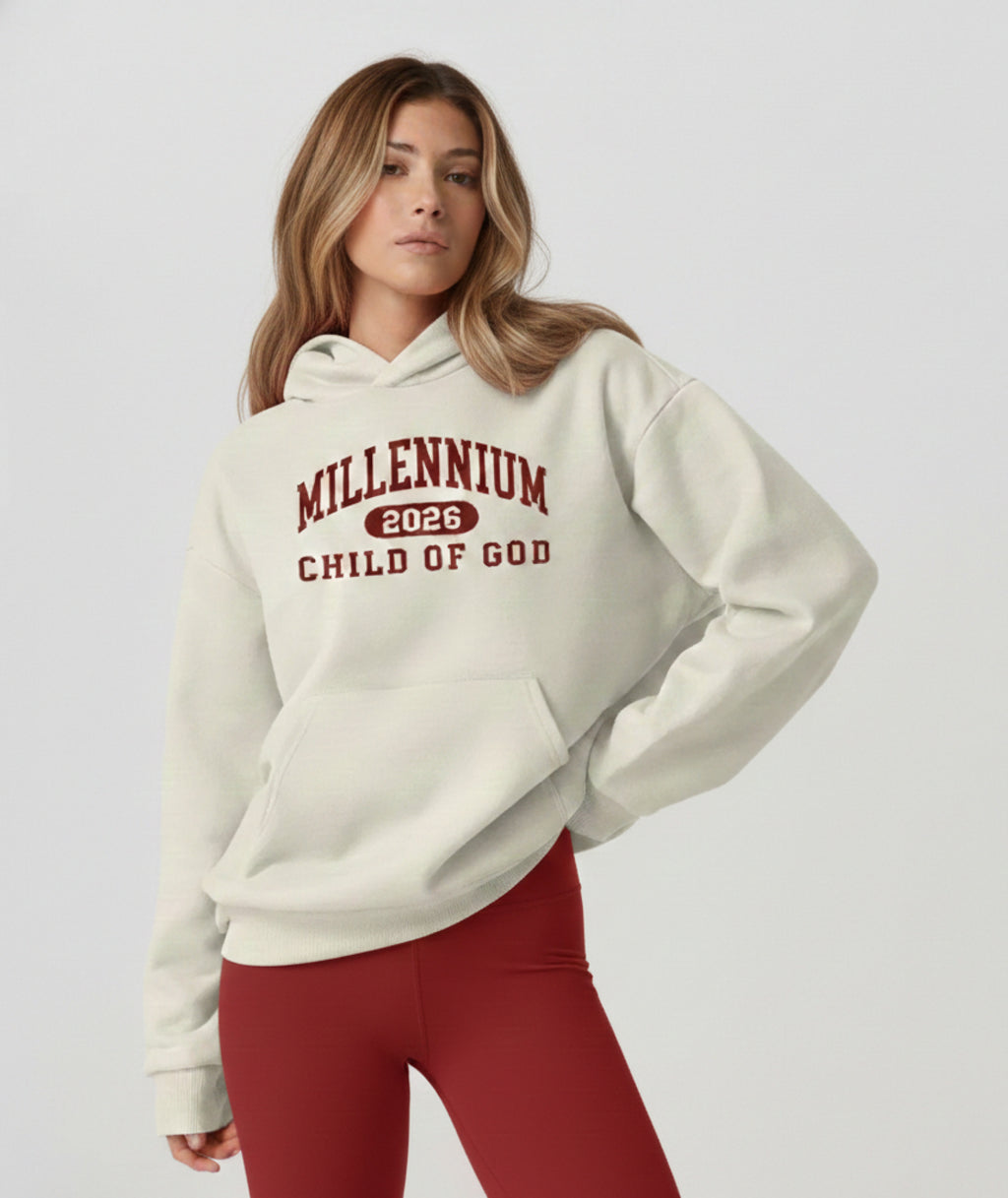 Child of God garment-dyed cream hoodie with a vintage varsity mark in burgundy
