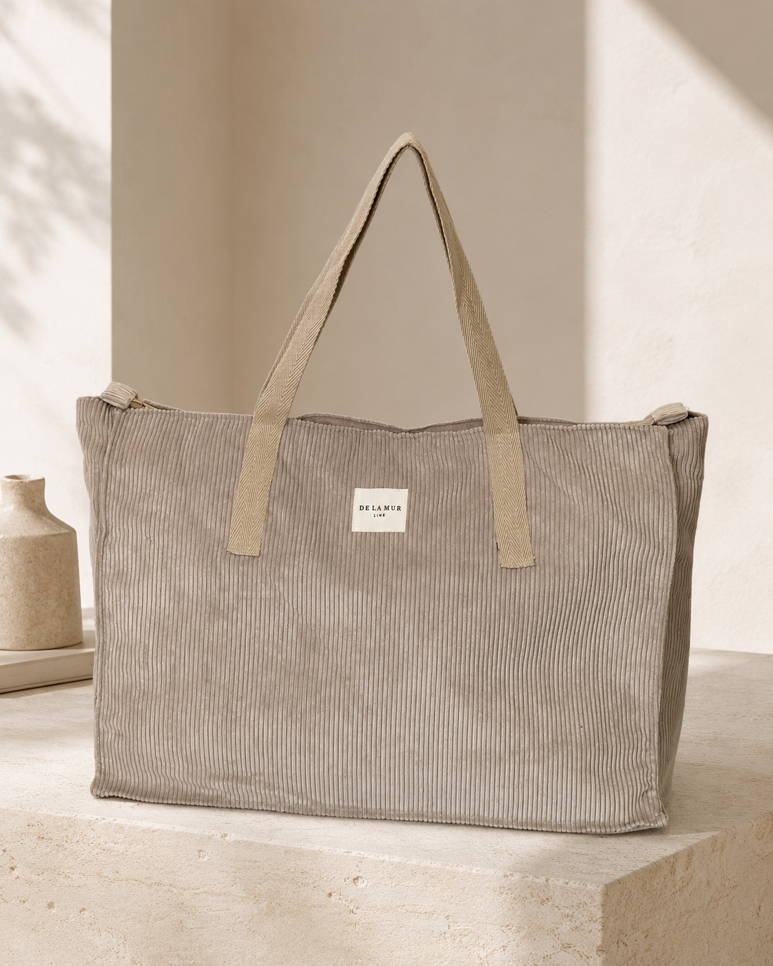 Toffee beige corduroy temple bag with top zip and interior pocket, made in Spain