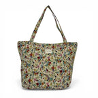 Cottage Garden floral-jacquard zippered tote bag with roomy interior, made in Spain