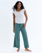 White lace scoop-neck cap-sleeve tee with a fitted silhouette