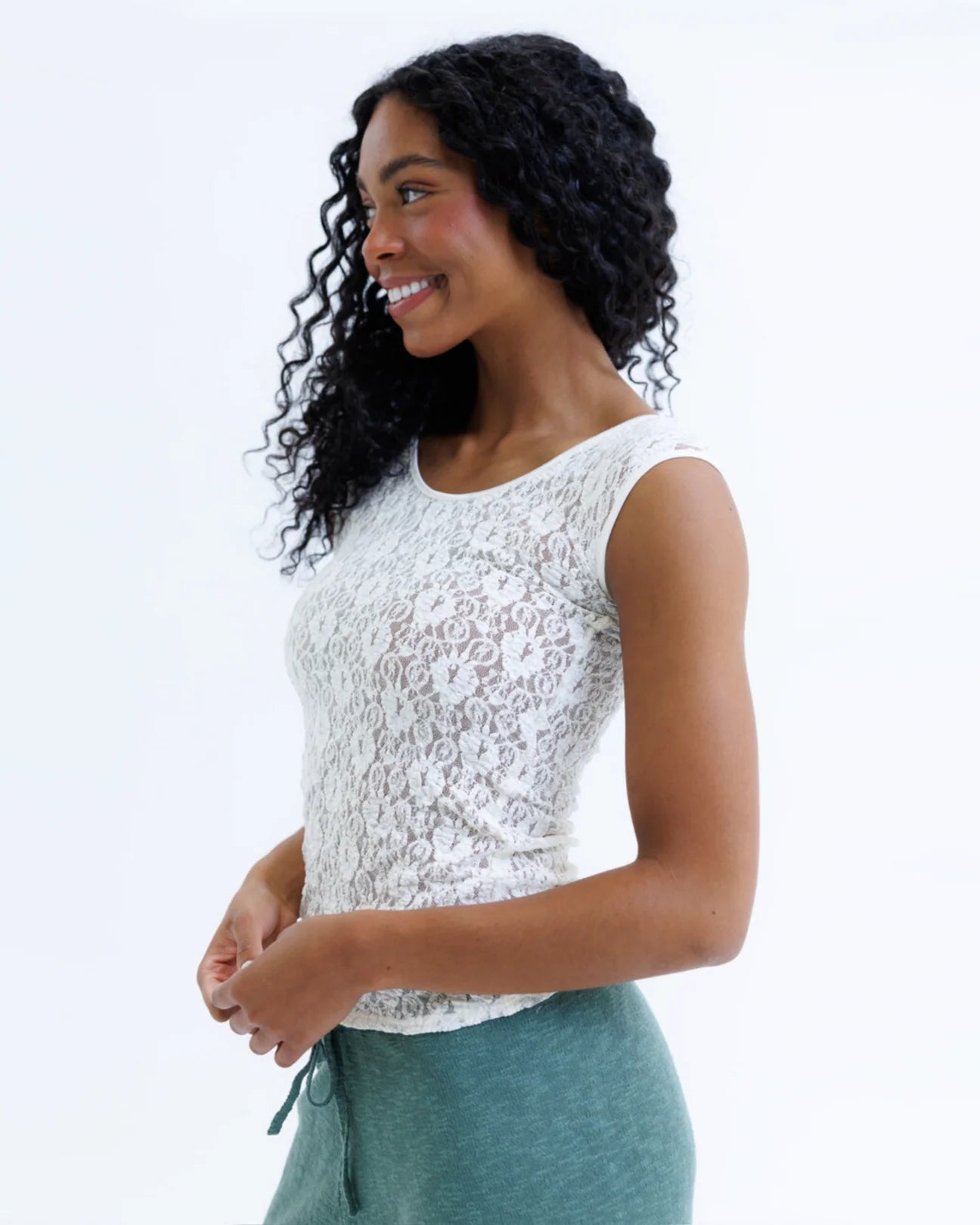 White lace scoop-neck cap-sleeve tee with a fitted silhouette