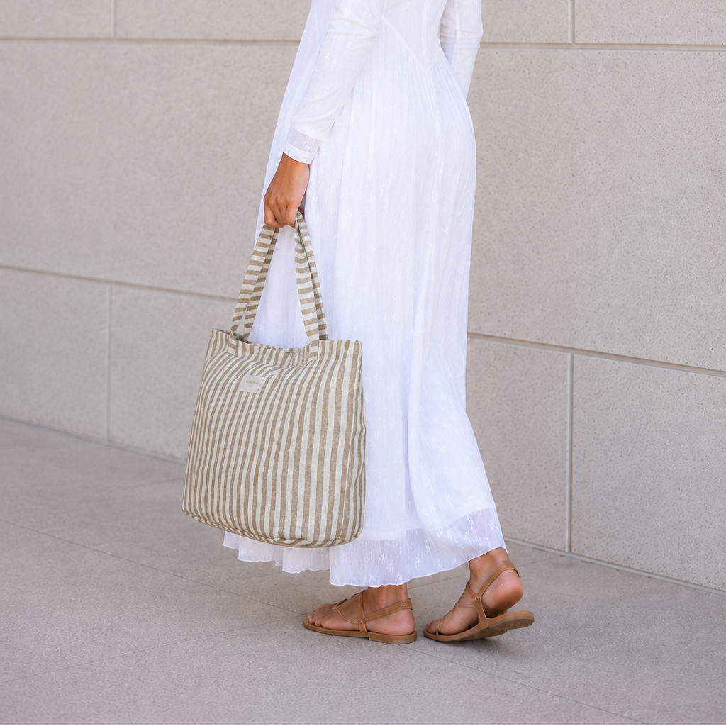 Mustard-stripe zippered temple tote with a Lurex shimmer, made in Spain