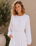 The Rome white Swiss-dot lace LDS temple dress with bishop sleeves and a tiered skirt
