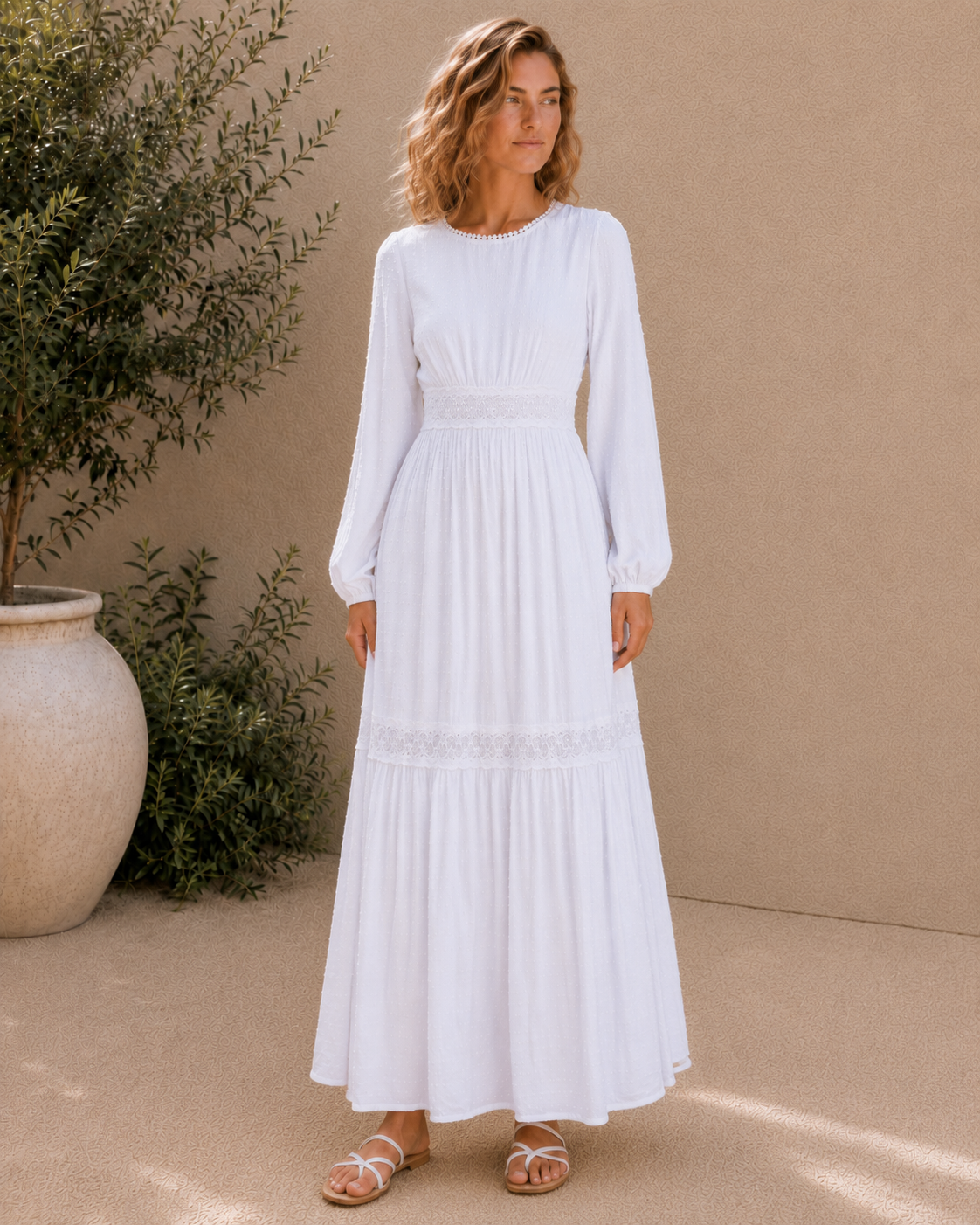 The Rome white Swiss-dot lace LDS temple dress with bishop sleeves and a tiered skirt