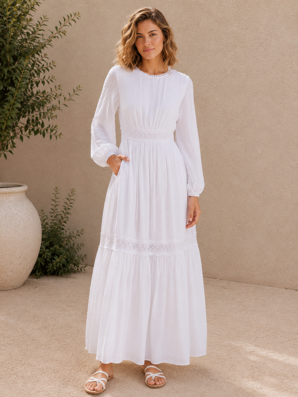 The Rome white Swiss-dot lace LDS temple dress with bishop sleeves and a tiered skirt