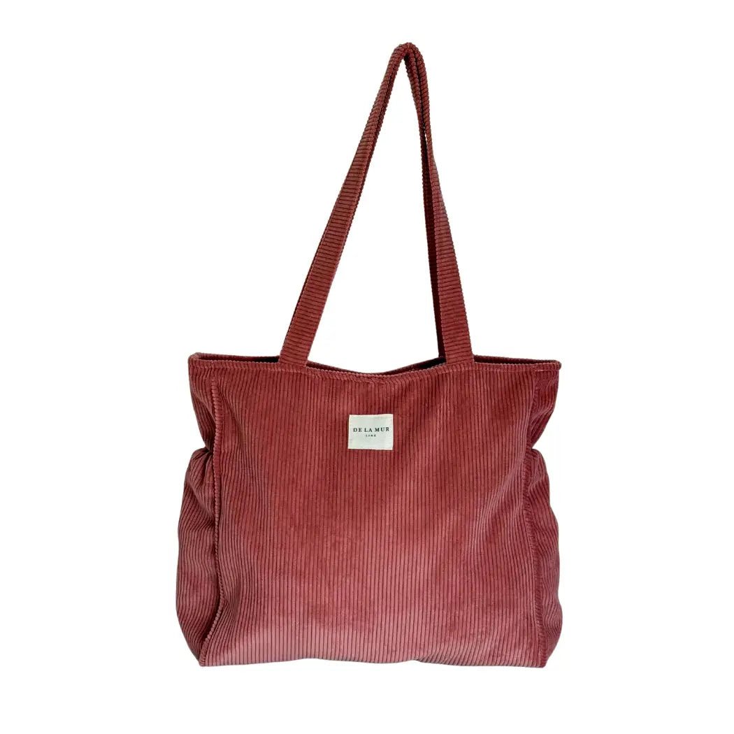 Coral corduroy shoulder bag with side pockets and top zip, made in Spain