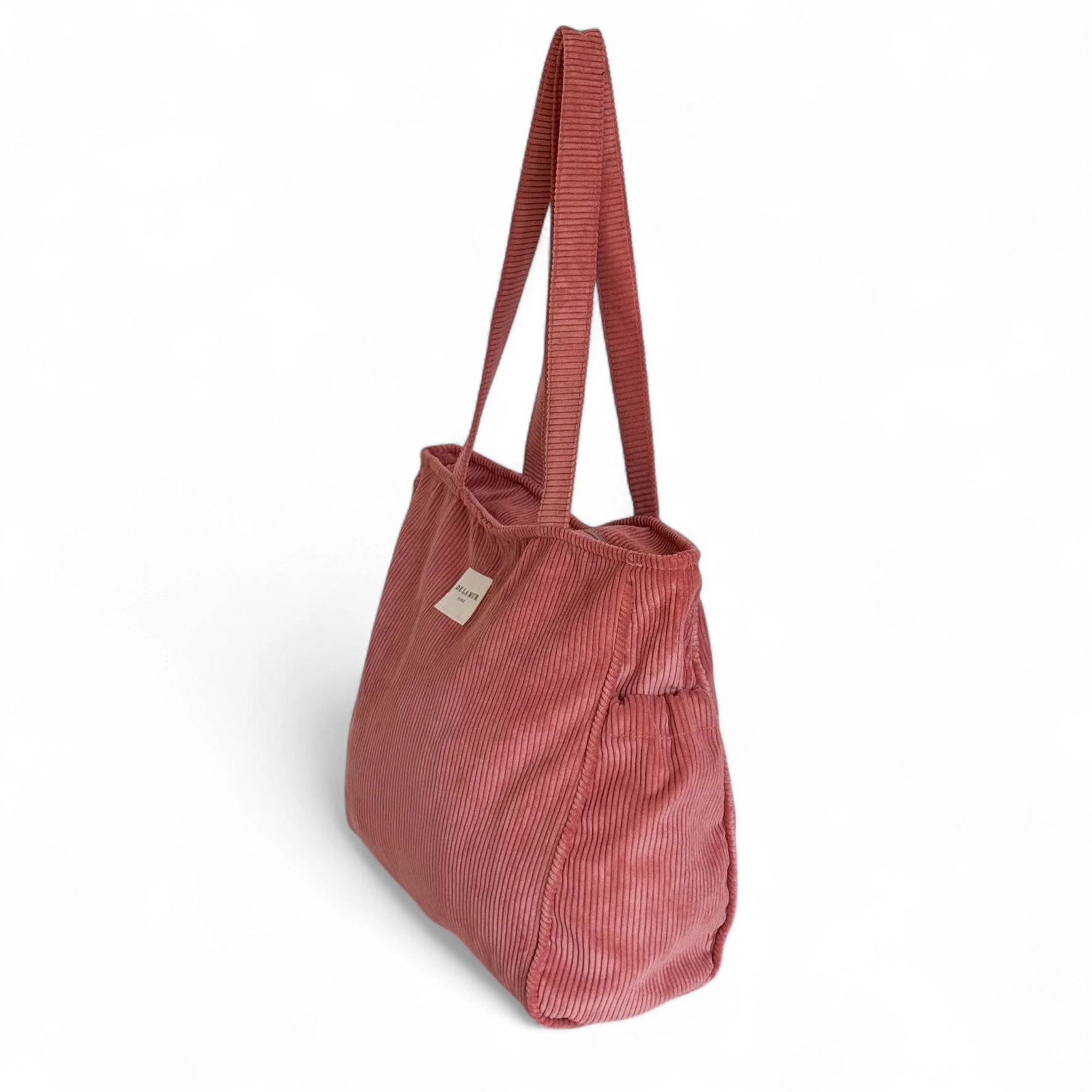 Coral corduroy shoulder bag with side pockets and top zip, made in Spain