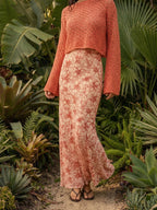 The Crimson Garden red floral-mesh modest maxi skirt with a mermaid silhouette and godet pleats