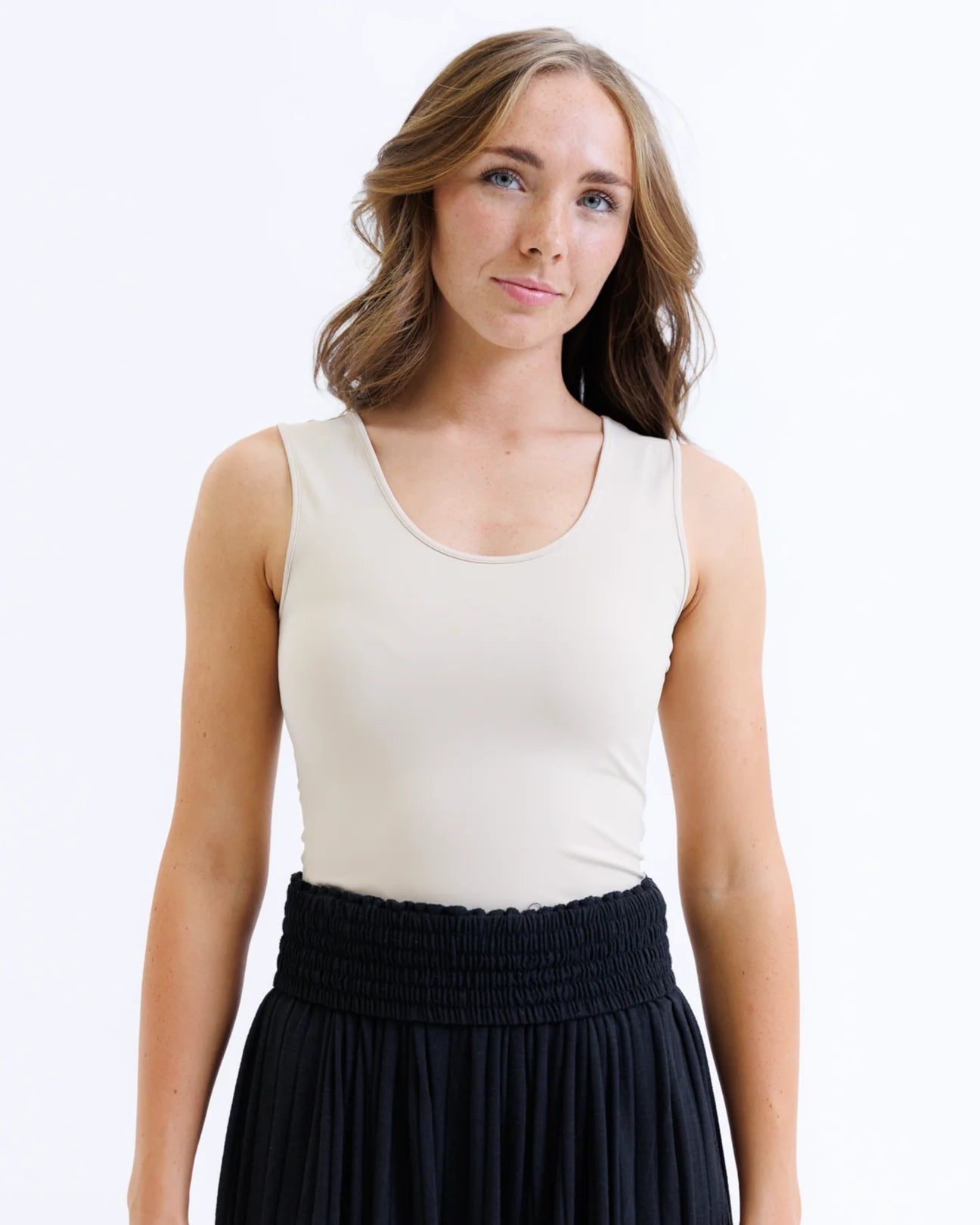 Smoothing contour layering tank top in black and nude stretch fabric