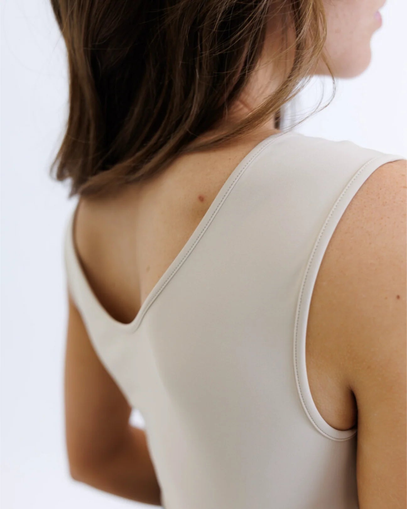Smoothing contour layering tank top in black and nude stretch fabric