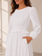 The Willamette Valley soft tiered-ruffle white LDS temple dress with long sleeves and pockets