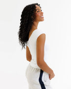 White fitted scoop-neck tee with cap sleeves and cotton stretch fabric